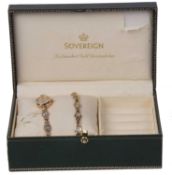 Boxed 'sovereign' ladies 9ct gold watch and matching bracelet each highlighted with pale blue