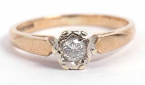 9ct gold single stone diamond ring, the small round brilliant cut diamond illusion set and raised