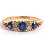 Antique 18ct gold sapphire and diamond ring featuring three graduated round cut sapphires