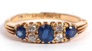 Antique 18ct gold sapphire and diamond ring featuring three graduated round cut sapphires