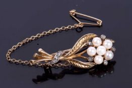 9ct gold seed pearl and diamond brooch, a floral spray design featuring five small seed pearls and