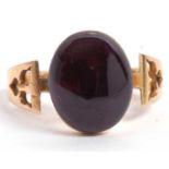 Victorian 15ct gold garnet single stone ring, the oval shape cabochon garnet measures 13x10mm in a