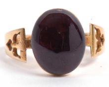 Victorian 15ct gold garnet single stone ring, the oval shape cabochon garnet measures 13x10mm in a