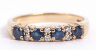 9ct gold sapphire and diamond ring featuring four small round faceted cut sapphires and six small