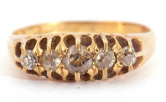 Antique 18ct gold diamond ring featuring five graduated old cut diamonds, each individually claw set