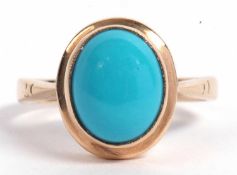 9ct gold and turquoise ring, the oval cabochon turquoise bezel set in a plain polished mount,