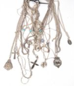Mixed lot of white metal chains and pendants to include crosses, lockets, and fobs etc, g/w 196 gms