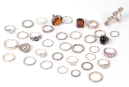 Mixed lot of mainly 925 white metal rings together with a cubic zirconia 9ct gold three stone