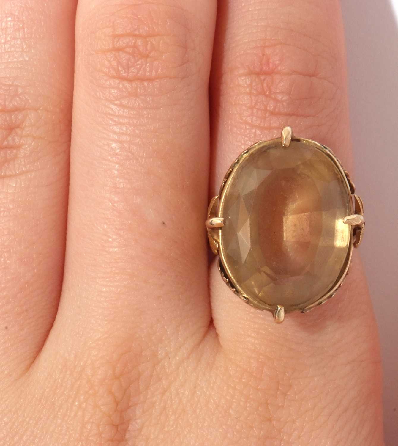 Large lemon citrine dress ring, the oval faceted citrine in cardinal set and raised between chased - Image 6 of 7