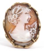 9ct gold cameo ring, the oval carved shell cameo depicting a profile of a classical lady, 25x20mm,