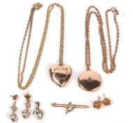 Mixed Lot: Two lockets, a heart and a circular shaped example stamped 9ct back and front, one