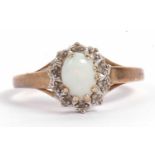 Modern 9ct gold opalescent and diamond cluster ring, size P-Q