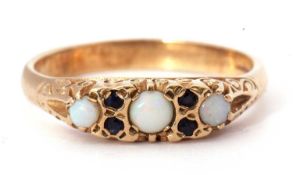 9ct gold opal and sapphire ring featuring three small graduated round cut opals highlighted