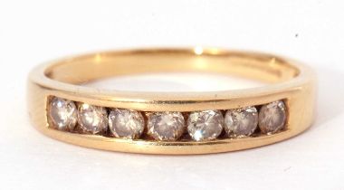 18ct gold diamond half hoop ring featuring seven round brilliant cut channel set diamonds, size P