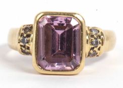 High grade yellow metal pink stone ring, the bezel set pink stone is 10x8mm raised between white