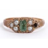 Antique Emerald and seed pearl ring, the stepped emerald framed in a bead and leaf setting and