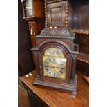Barwise, London, heavily carved mahogany cased bracket clock, striking on 4 bells, purchased from