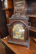 Barwise, London, heavily carved mahogany cased bracket clock, striking on 4 bells, purchased from