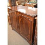 Georgian mahogany two door linen press cabinet with inlaid decoration raised on ogee feet, 122 cm
