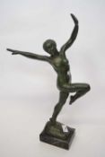 Green patternated figure of a Art Deco dancer, on onyx base, the figure stamped Reto, 45cm high
