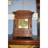 Winterhalder & Hofmeier - Carved oak cased mantel clock with striking movement, brass back