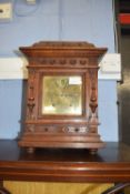 Winterhalder & Hofmeier - Carved oak cased mantel clock with striking movement, brass back