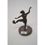 Spelter model of an Indonesian juggler or dancer on circular onyx base, 30cm high