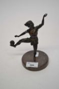 Spelter model of an Indonesian juggler or dancer on circular onyx base, 30cm high