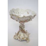 19th Century continental porcelain centre piece with floral decoration in relief, the bowl also with