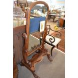 Victorian mahogany framed cheval mirror with scrolled side supports and outswept legs, 147cm high