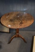George III oak circular topped table with turned column and tripod base, top is 70 cm diameter