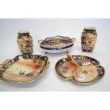 Quantity of Noritake wares mainly with desert scenes comprising dishes and a pair of vases