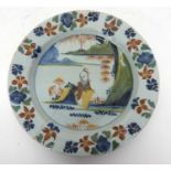 An English delft plate with polychrome chinoiserie design23cmbroken and re-stuck
