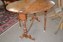 Victorian walnut veneered circular drop leaf Sutherland style table raised on turned supports with