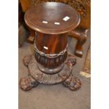 Unusual 19th Century and later small mahogany pedestal table or plant stand, raised on four paw