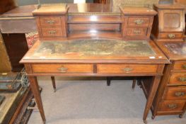 Late 19th or early 20th Century rosewood writing table, the top with shelves, brass gallery and four