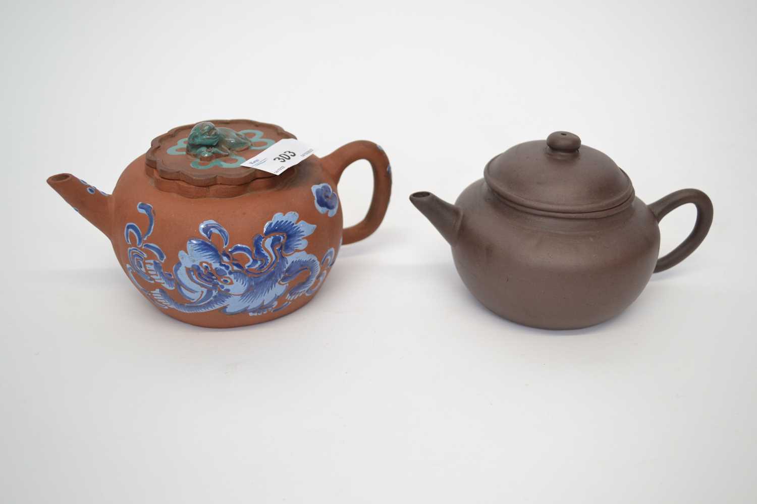Two Yixing teapots, one with blue enamel dragon decoration (2)