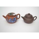 Two Yixing teapots, one with blue enamel dragon decoration (2)