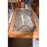 Large Chinese hardwood opium type coffee table, the centre with pierced wooden mesh type design with