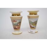 Pair of early 19th Century spill vases with painted with landscape scenes, 12cm high