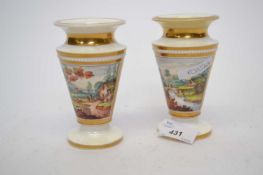 Pair of early 19th Century spill vases with painted with landscape scenes, 12cm high