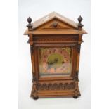 Late 19th Century carved wooden mantel clock with gilt brass dial, 45cm high