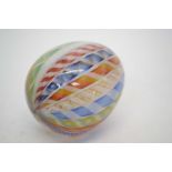 Unusual glass egg with polychrome striped designs probably Murano
