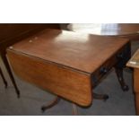 19th Century mahogany pedestal pembroke table raised on turned column and outswept legs with brass