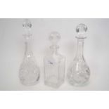 Group of three cut glass decanters