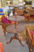 Victorian mahogany three tier circular dumb waiter raised on tripod base, approx 125 cm high