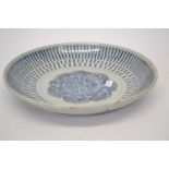 Chinese porcelain dish with blue and white design with a zhou symbol to the centre, 27cm diameter