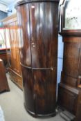 Georgian mahogany floor standing bow front four door corner cabinet with shelved interior, 199cm