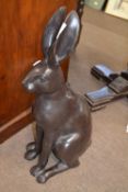 Contemporary bronzed metal model of a sitting hare, 61 cm high