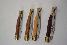 Bag containing four penknives by Laguiole